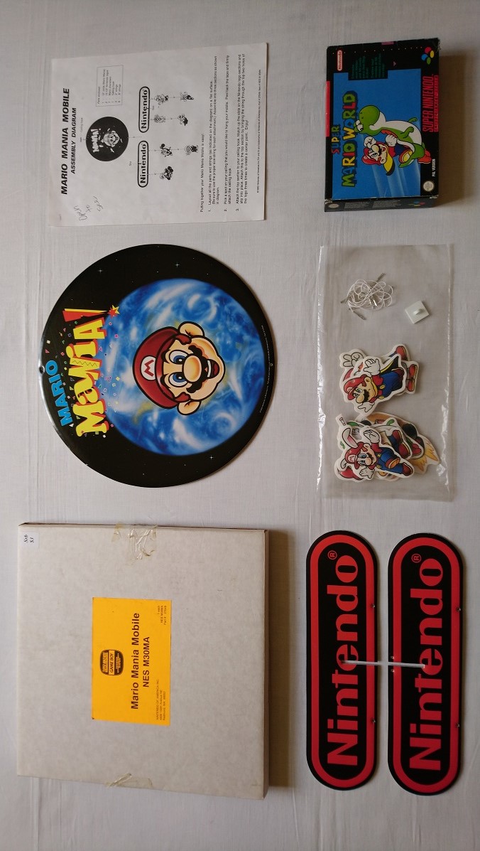 Mario Mania store display sign mobile promo snes